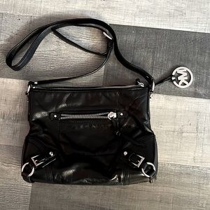 Black Michael by Michale Kors, black, crossbody bag, good condition, size 11x8.